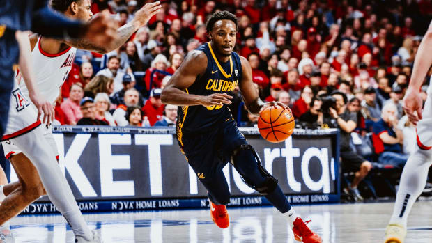 Jalen Celestine drives toward the basket.